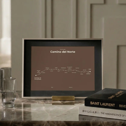 Minimalist Camino del Norte map poster in ashen clay color, interior mockup.
