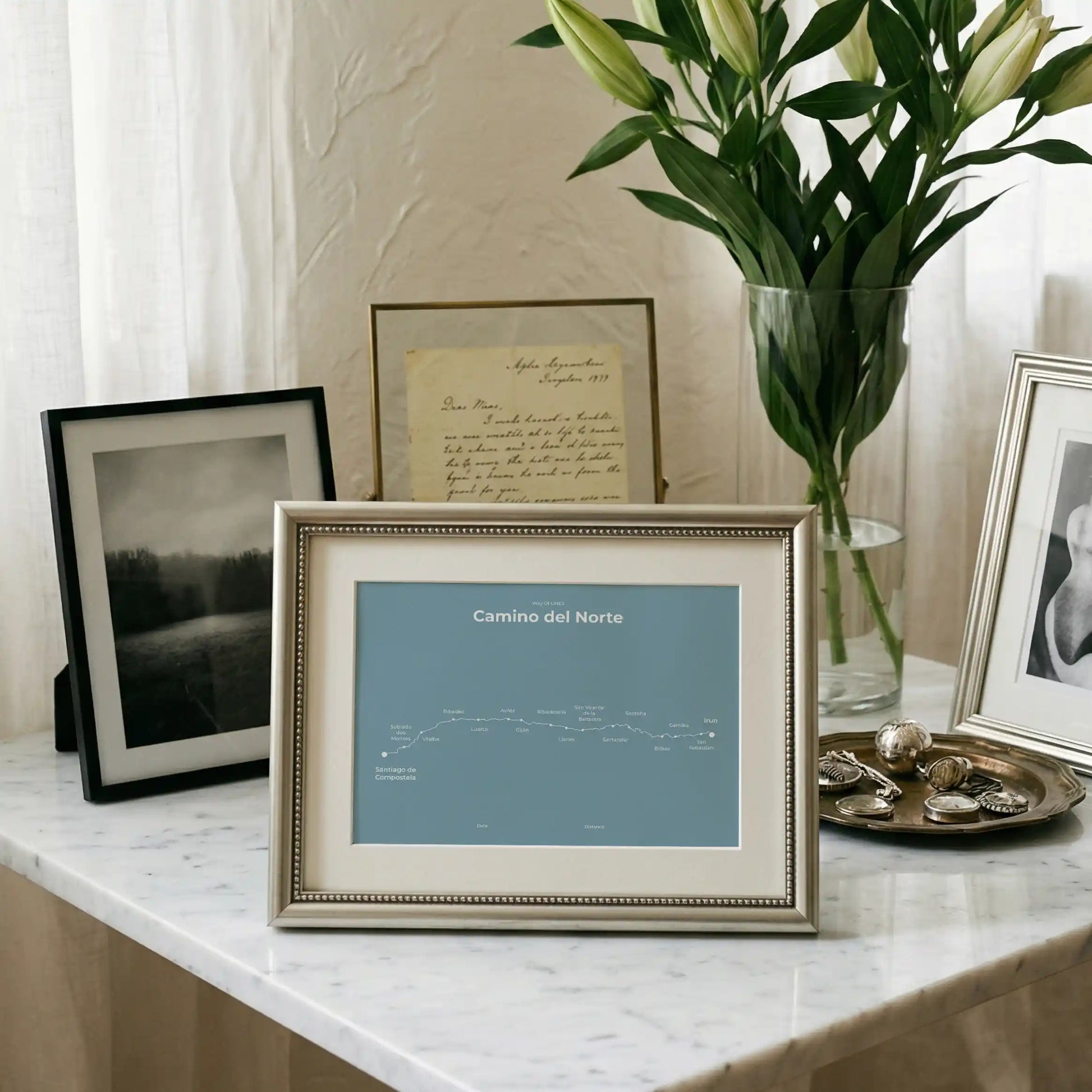 Minimalist Camino del Norte map poster in high mist color, interior mockup.
