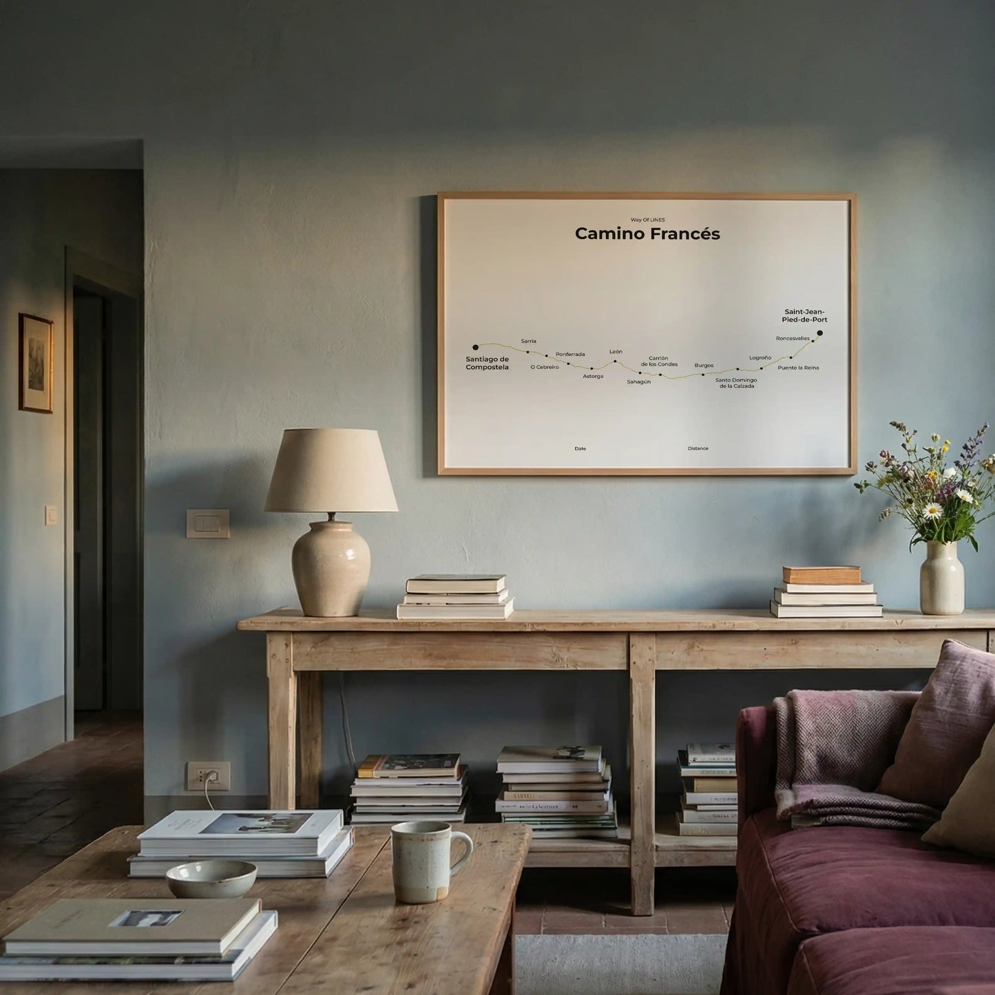Minimalist Camino Francés map poster in sunworn color, interior mockup.
