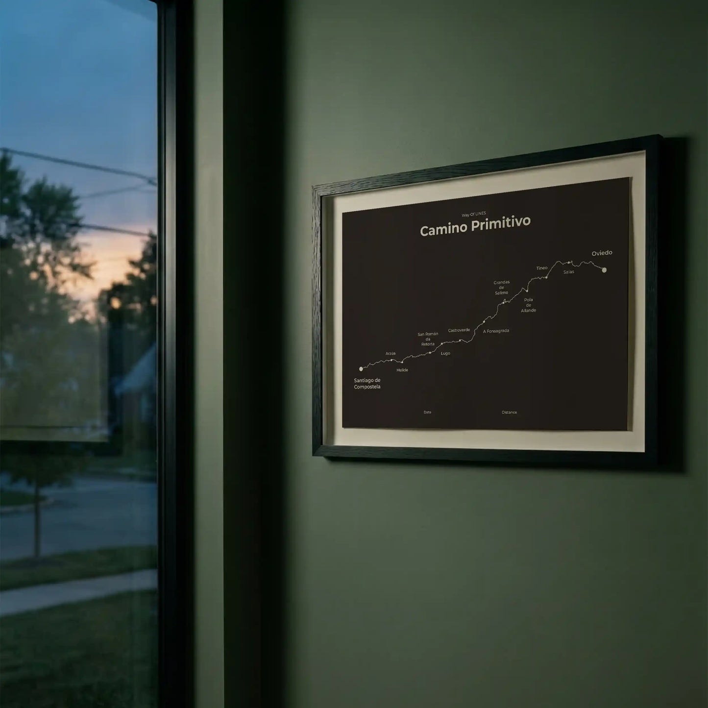 Minimalist Camino Primitivo map poster in deep bark color, interior mockup.
