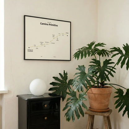 Minimalist Camino Primitivo map poster in sunworn color, interior mockup.
